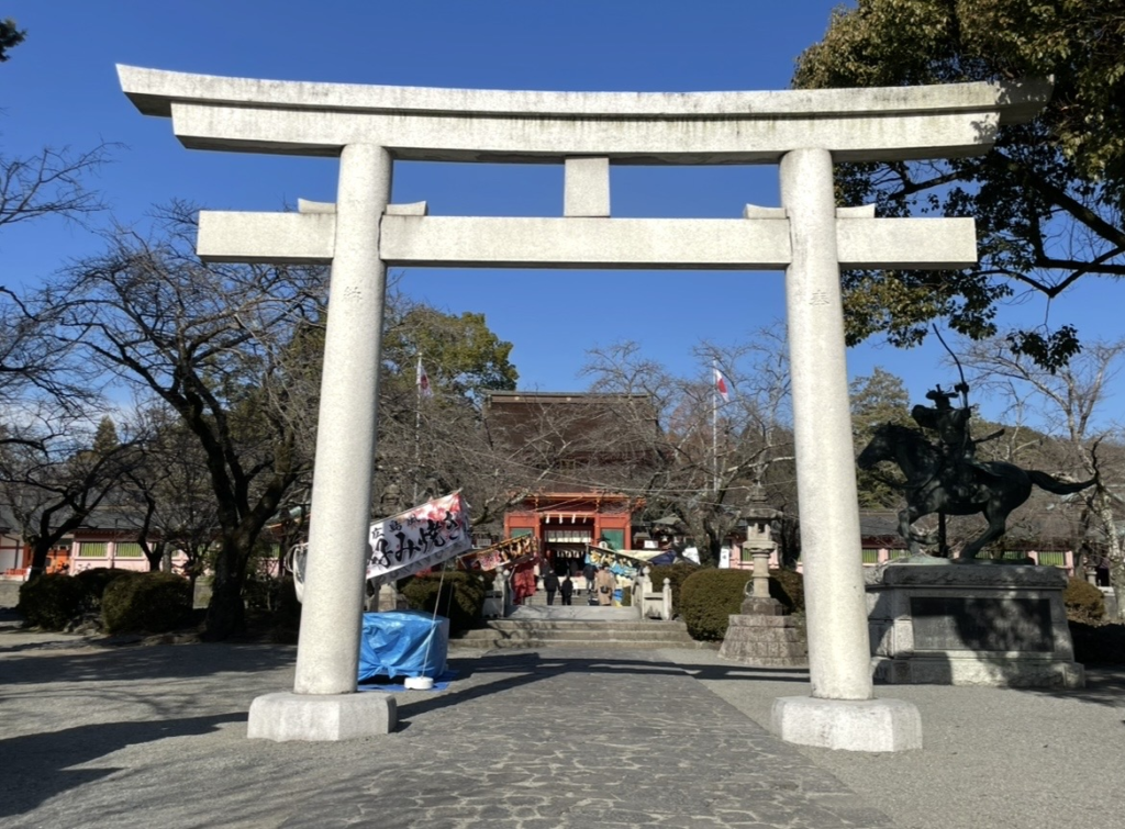 The Third Torii Gate of Fujisan Hongu Sengen Taisha, with the shrine’s main approach, worship hall in the background, and the Yabusame archer statue on the right side.