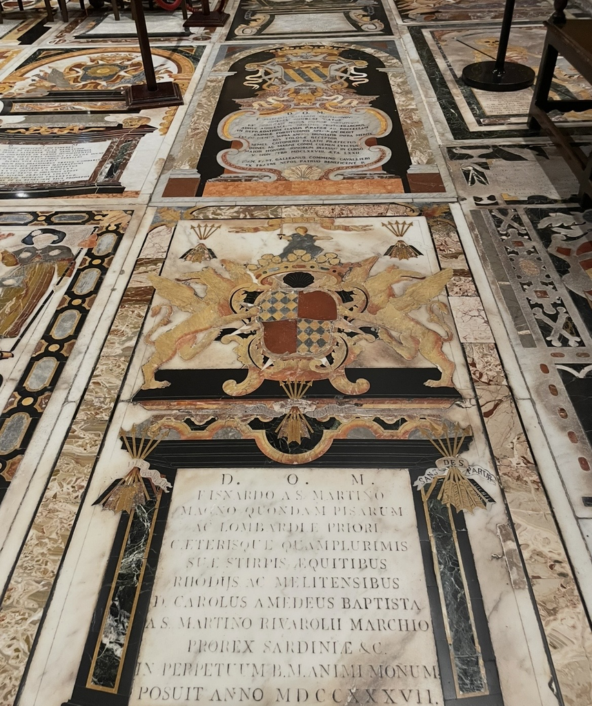 Marble tombstones of the Knights covering the floor of St. John’s Co‑Cathedral, decorated with colorful stone inlays and heraldic emblems. A striking landmark that reflects Malta’s deep and storied history.